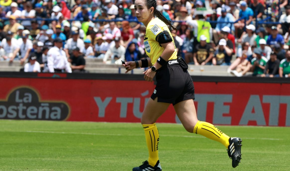 Referee Katia Itzel Garcia Mendoza officiates during the match corresponding to matchday 14 of the 2026 Clausura Tournament of the Liga BBVA MX, between Pumas UNAM and Canoneros Mazatlan FC, at the Estadio Olimpico Universitario, in Mexico City, Mexico, on April 12, 2026. The match ends with a score of Pumas 3-1 Mazatlan. (Photo by Jose Luis Torales/NurPhoto)