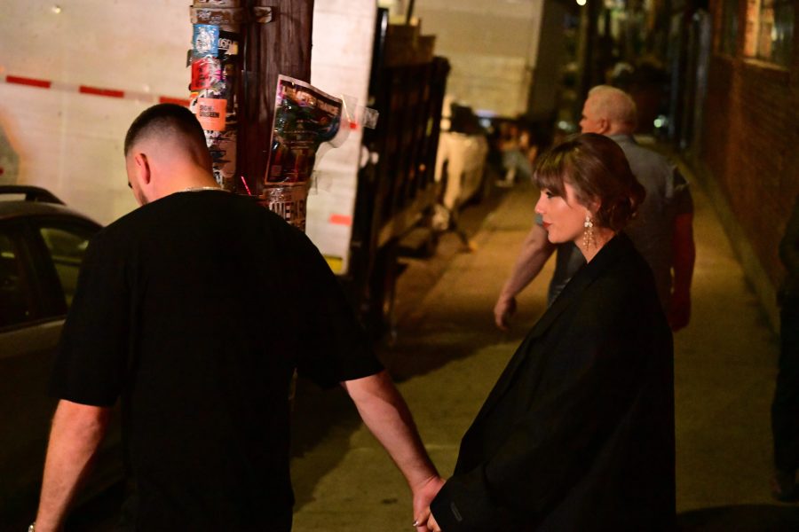 Taylor Swift and Travis Kelce exit an event at Honey's on Scott Avenue in Brooklyn, New York, United States, on May 17, 2026. On May 16, 2026, Swift and Kelce attended an event at Honey's, a bar and event space co-founded in 2016 by artist Arley Marks. They were inside the venue for several hours before leaving early Sunday morning. (Photo by Kyle Mazza/NurPhoto)