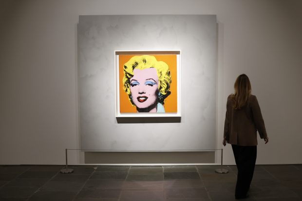 Andy Warhol's Shot Orange Marilyn (1964) is on display at a preview of Icons: Back to Madison at Sotheby's in New York City on Saturday, December 13, 2025. Icons: Back to Madison inaugurates the new global headquarters at the Breuer Building and brings together some of the most iconic works ever sold at Sotheby's. Photo by John Angelillo/UPI Photo via Newscom picture alliance