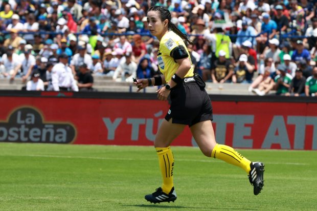 Referee Katia Itzel Garcia Mendoza officiates during the match corresponding to matchday 14 of the 2026 Clausura Tournament of the Liga BBVA MX, between Pumas UNAM and Canoneros Mazatlan FC, at the Estadio Olimpico Universitario, in Mexico City, Mexico, on April 12, 2026. The match ends with a score of Pumas 3-1 Mazatlan. (Photo by Jose Luis Torales/NurPhoto)